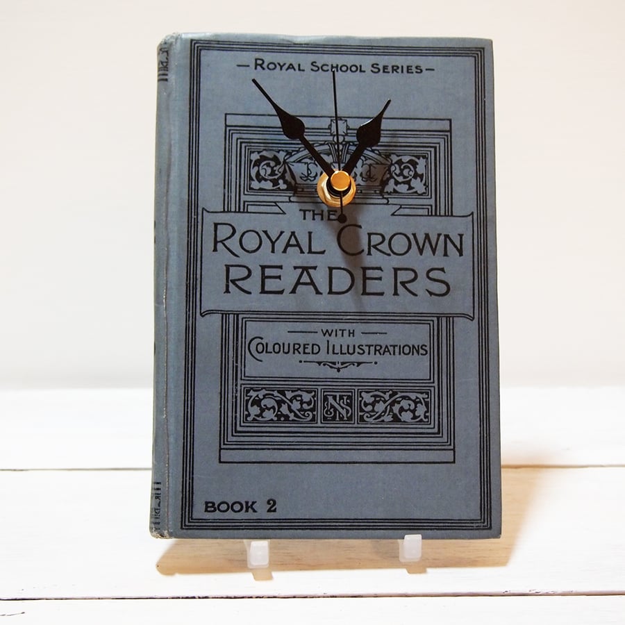 Clock upcycled from the book The Royal Crown Readers (1923).