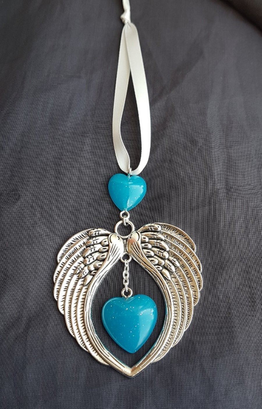 Gorgeous Angel Wings Ornament with Glittery Blue Hearts.
