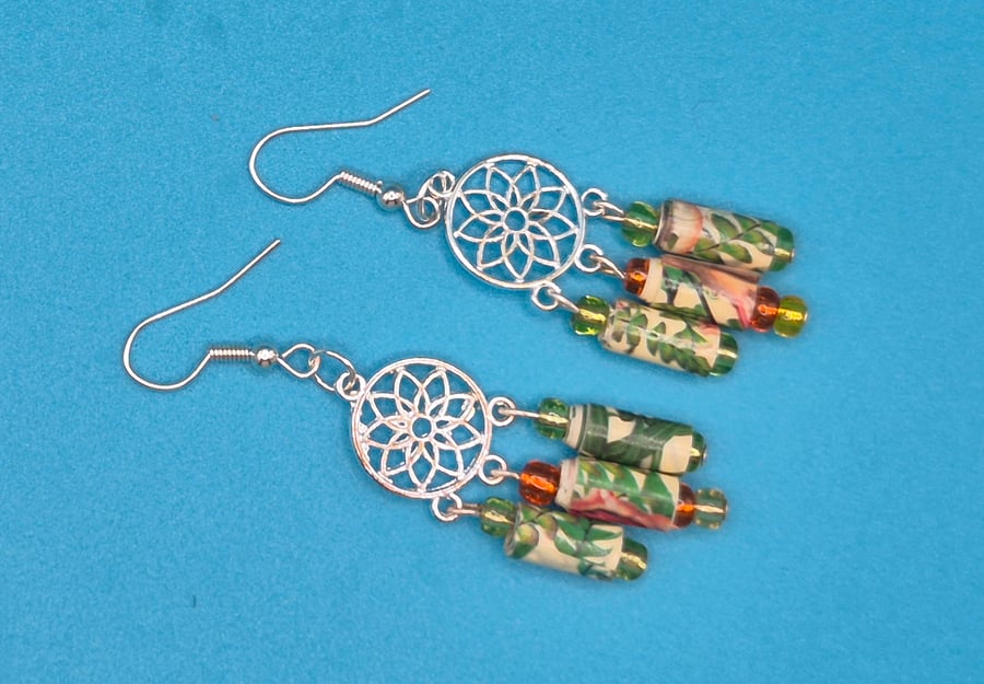 Flowery paper beaded earrings on a mandala finding