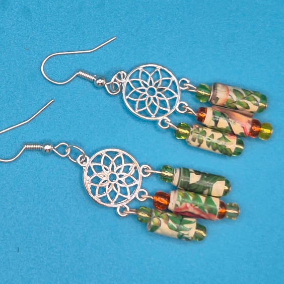 Flowery paper beaded earrings on a mandala finding