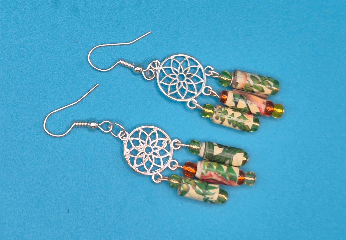 Flowery paper beaded earrings on a mandala finding