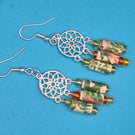 Flowery paper beaded earrings on a mandala finding