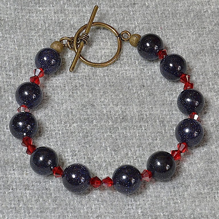 Blue Goldstone and Red Crystal Bracelet