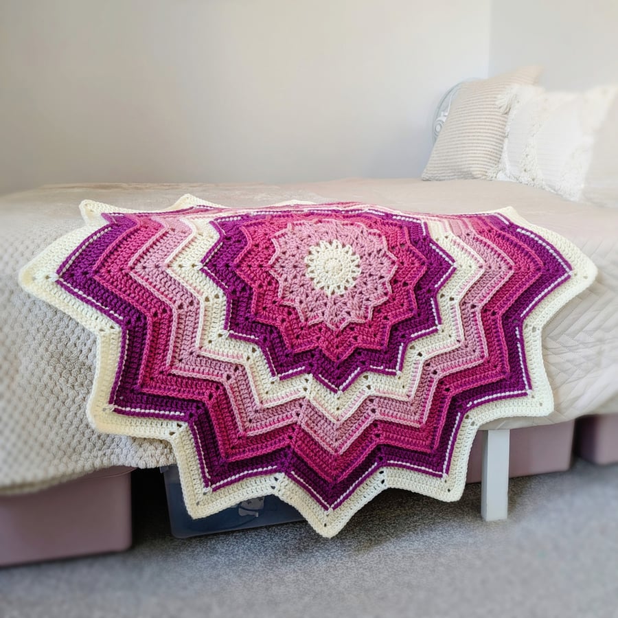 Pink star crochet stroller blanket
