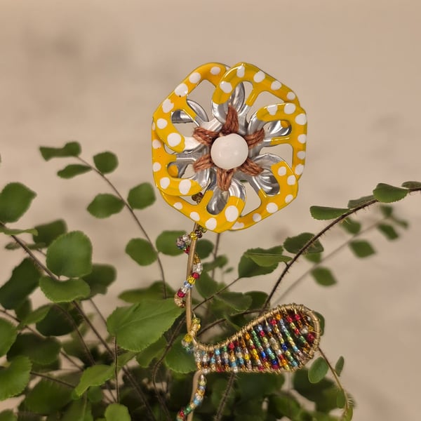 Yellow, white spotted & orange flower plant companion perfect for pot plants