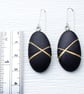Black pebble earrings, inspired by nature with gold lines and silver earwires - Image 4