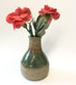 GREEN GLAZED STONEWARE CERAMIC BUD VASE - Image 1