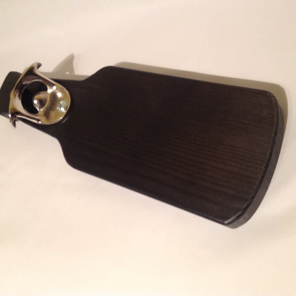 Wall mounted bottle opener