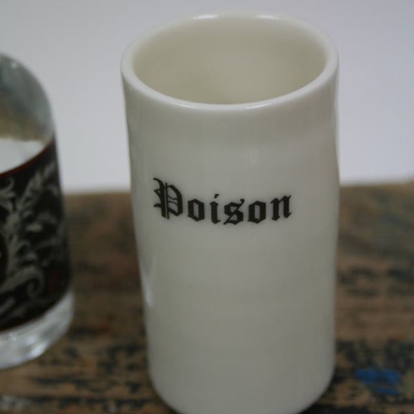 Porcelain shot 'glass' with poison wording