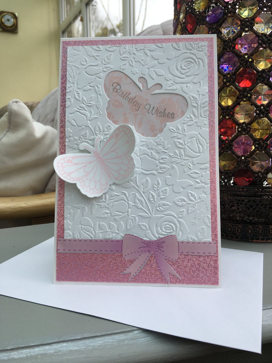 Butterfly and rose pretty in pink embossed birthday card