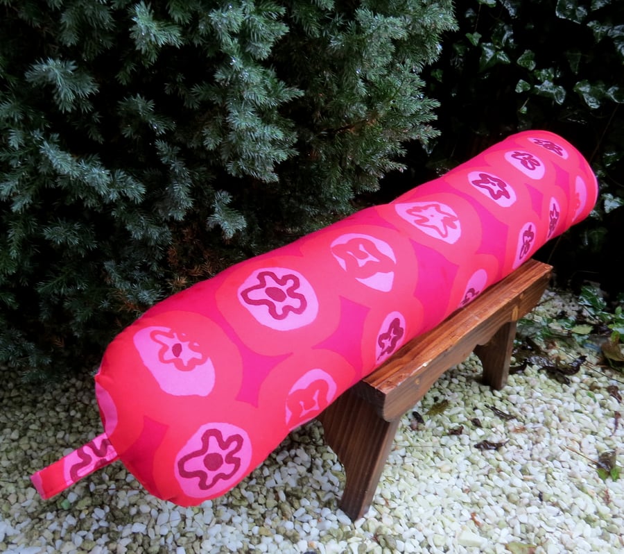 A draught excluder made from a vibrant Marimekko cotton. 88cm in length. 