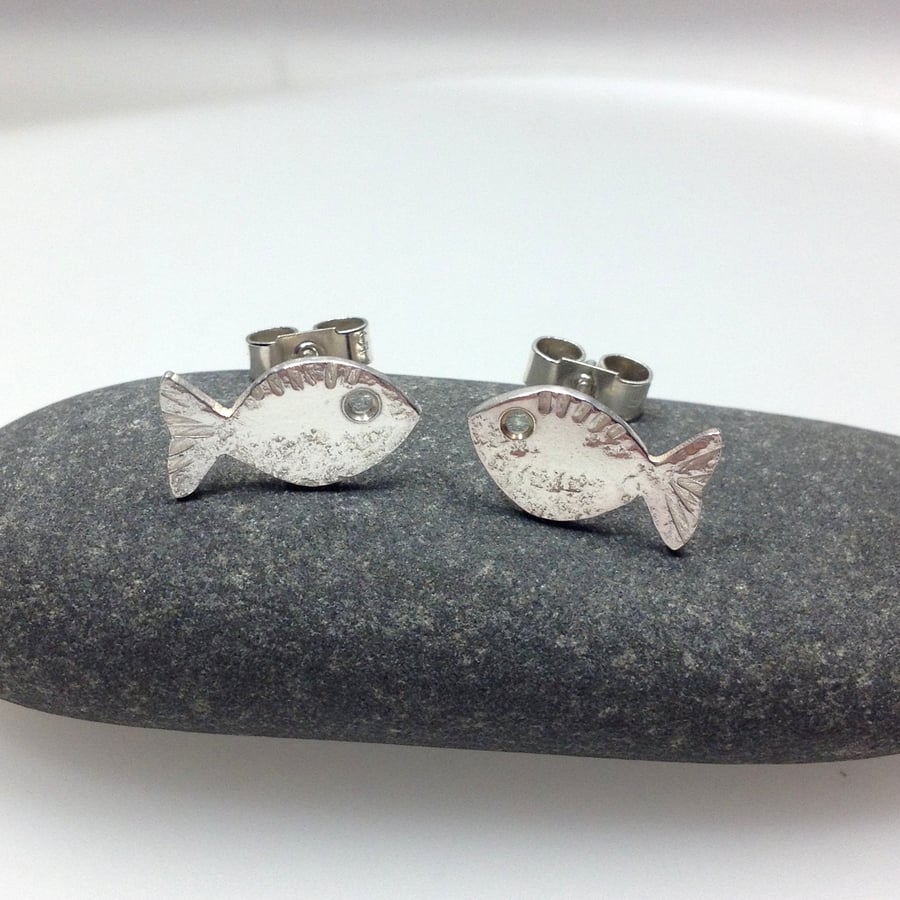 Silver fish stud earrings
