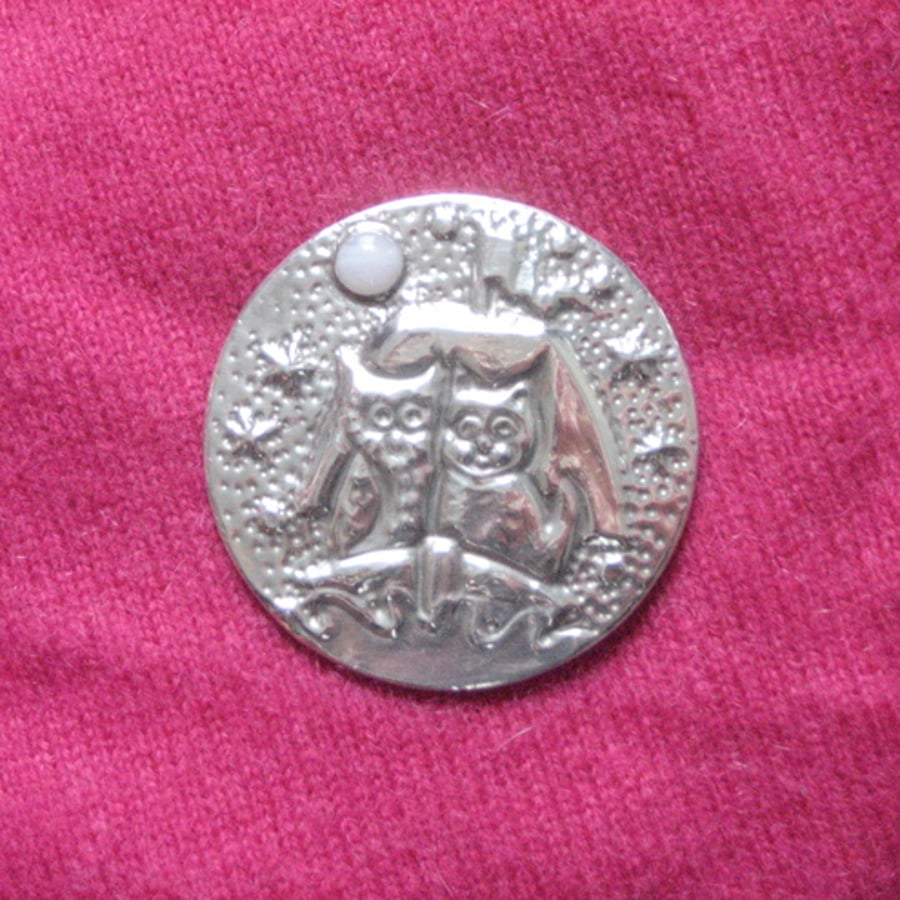 The owl and the pussycat brooch