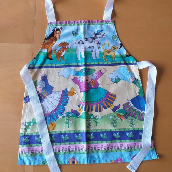 Old Woman who Swallowed a Fly, Apron, age 2-6 approximately