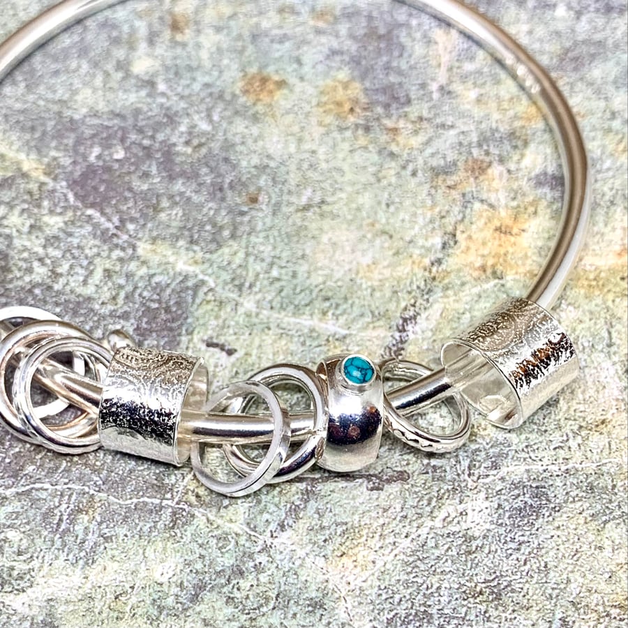 Sterling Silver Bangle with Turquoise and Silver Charms