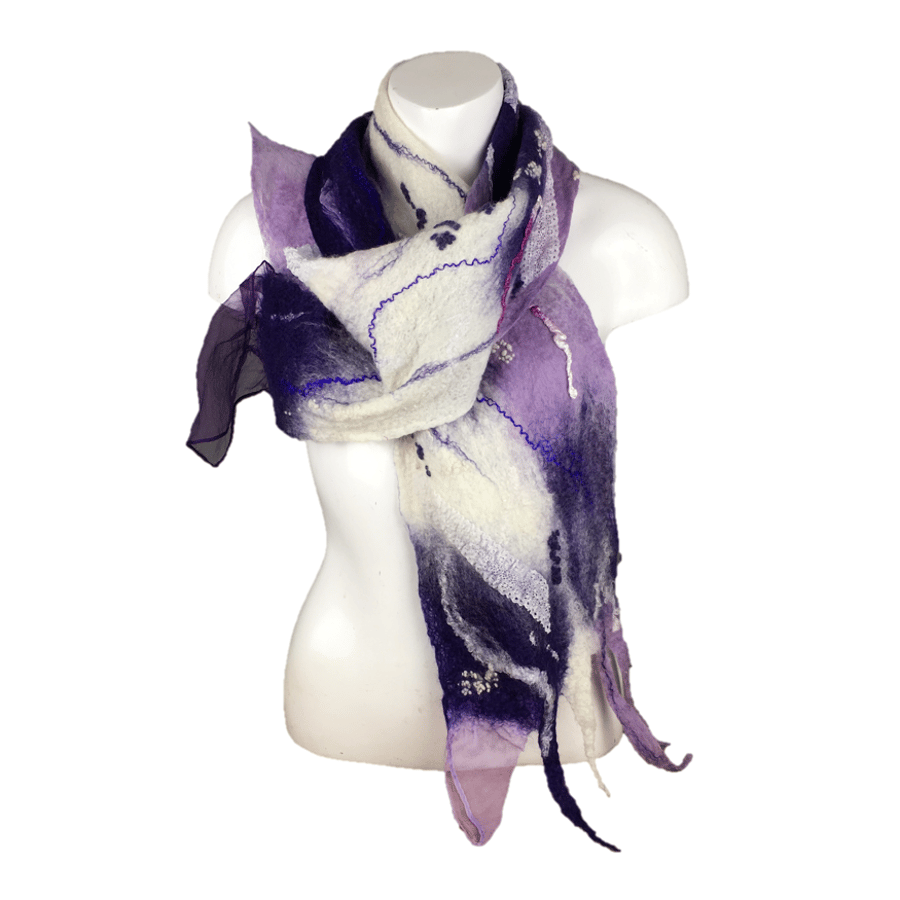Purple and white felted scarf with various decorative additions, gift boxed