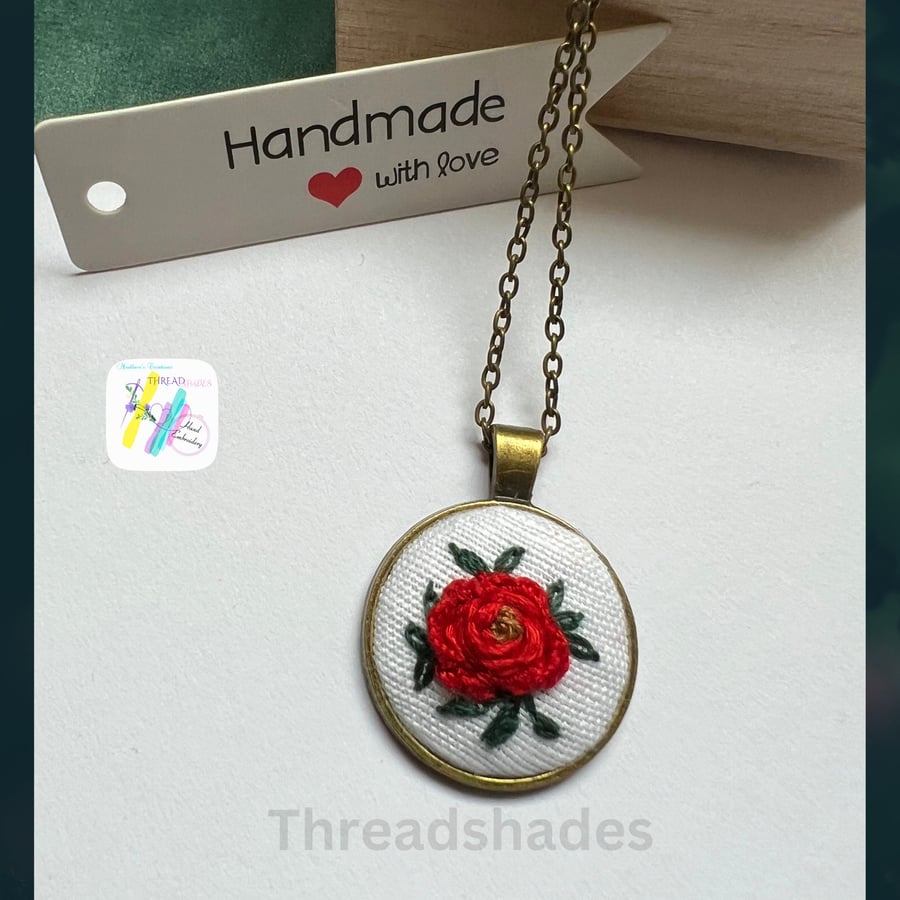 Hand embroidered pendant, round antique bronze, red rose design, handmade item, 