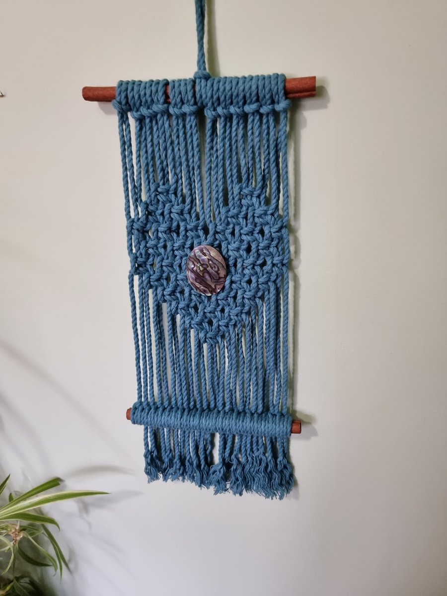 Cinnamon heart wall hanging with an abalone shell centre