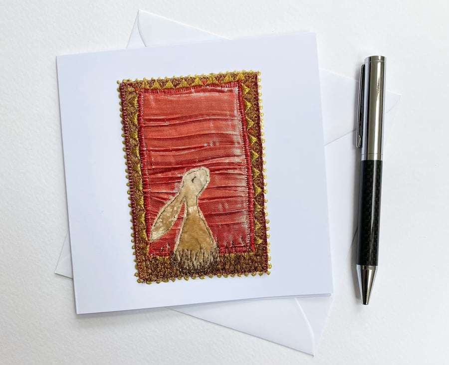 Up-cycled fabric embroidered hare or rabbit art card. 