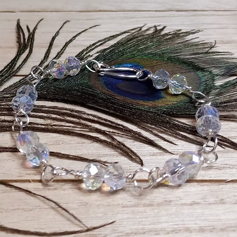 Twisted silver plated copper bracelet with double crystals