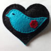 Heart with turquoise bird