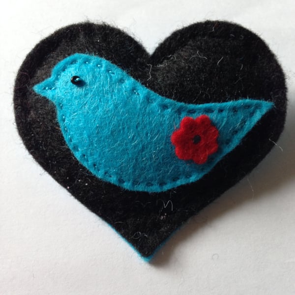 Heart with turquoise bird