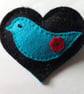 Heart with turquoise bird