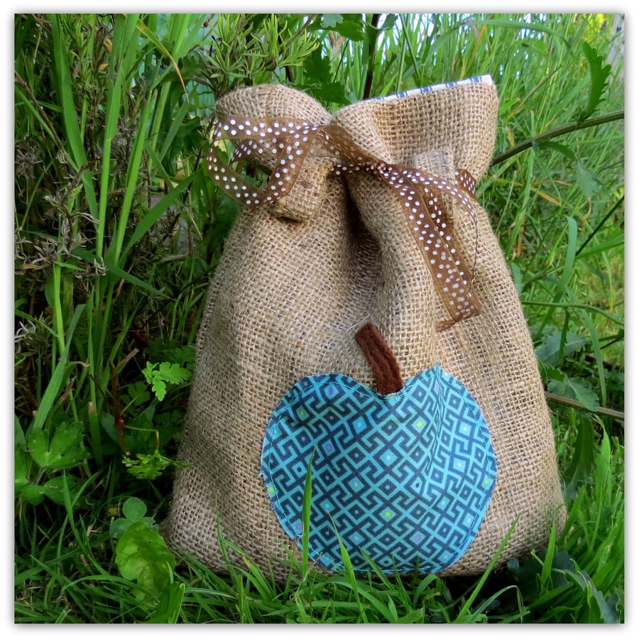 A rustic hessian gift bag.  Decorative storage.  Reusable.