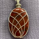 Hand wired 2 and a half inch Brazilian oval stone 