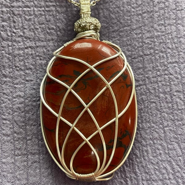 Hand wired 2 and a half inch Brazilian oval stone 