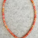 Coral dreams - coral coloured beads with starfish pendant