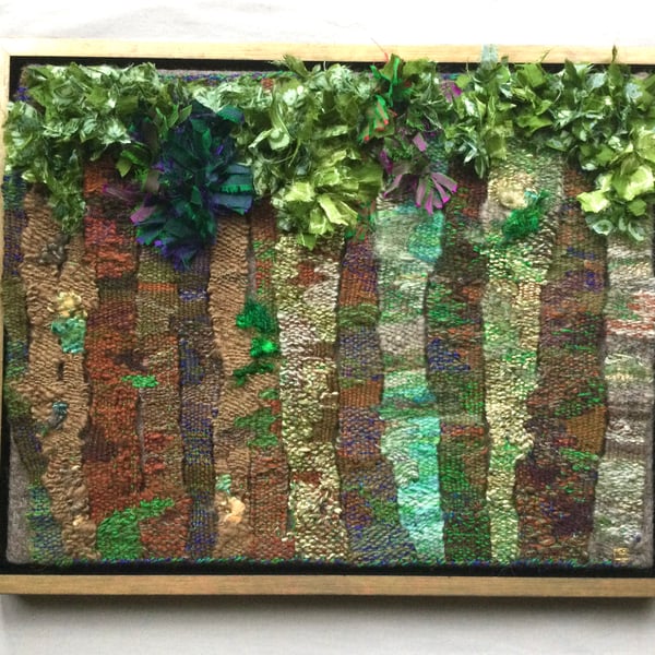 Framed handwoven tapestry weaving,  textile art in browns, greens and blues