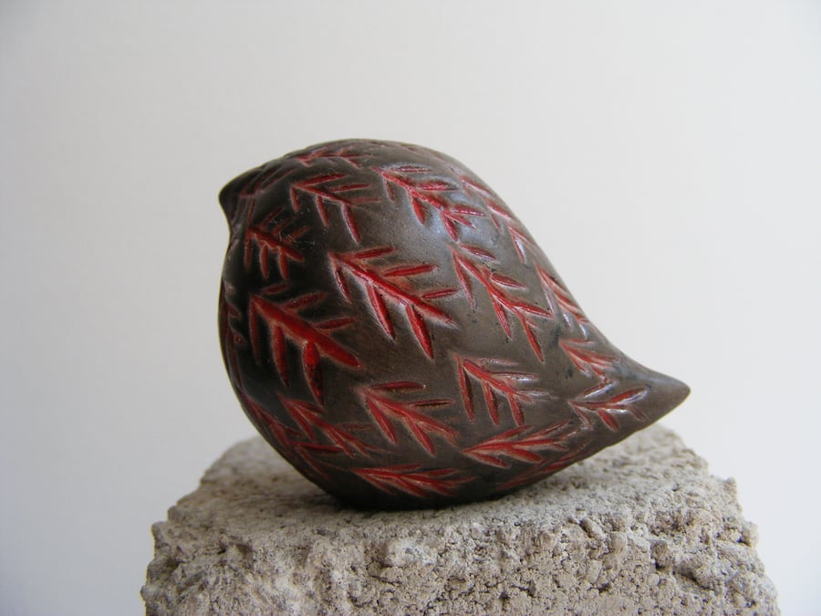 Baby carved raku bird