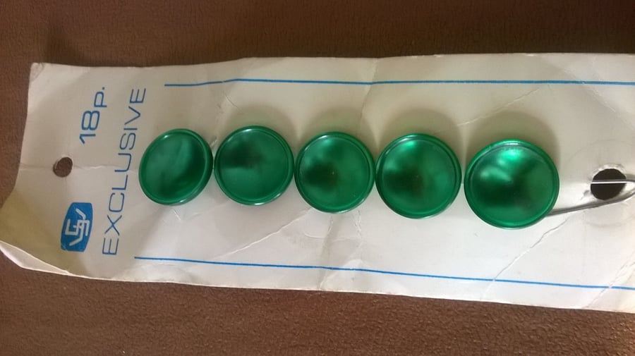 Set of  five emerald green vintage buttons 