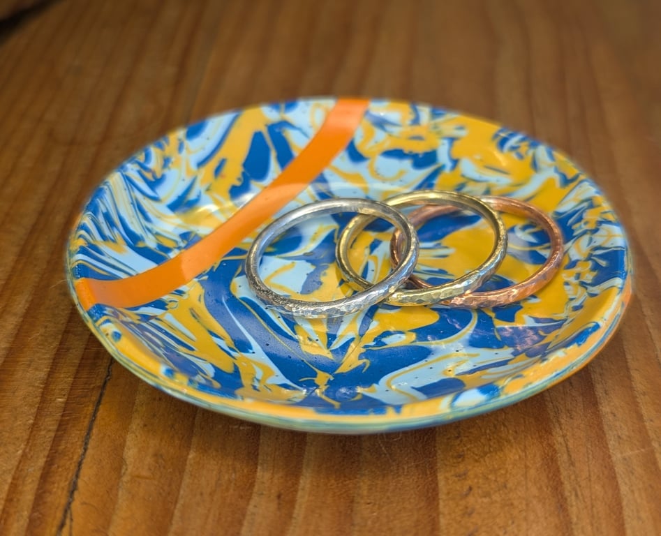 Blue trinket dish with orange stripe