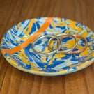 Blue trinket dish with orange stripe