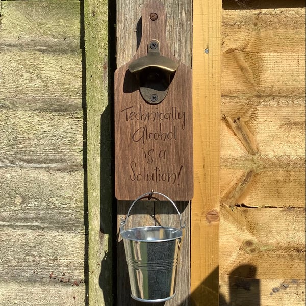 Wall mounted bottle opener with bucket cap catcher (alcohol solution)