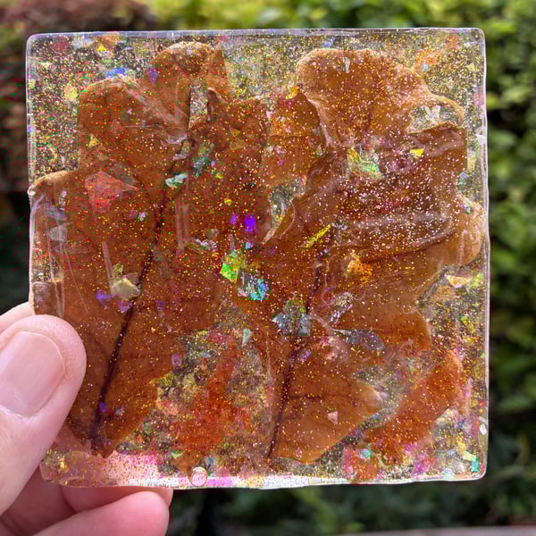 Set of two square resin coasters with dried leaves and holographic glitter