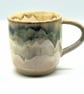 Large stoneware pottery mug finished in grey, brown, cream, white glaze.