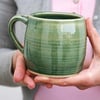 Two tankard style stoneware pottery tea mugs - hand thrown and glazed in green