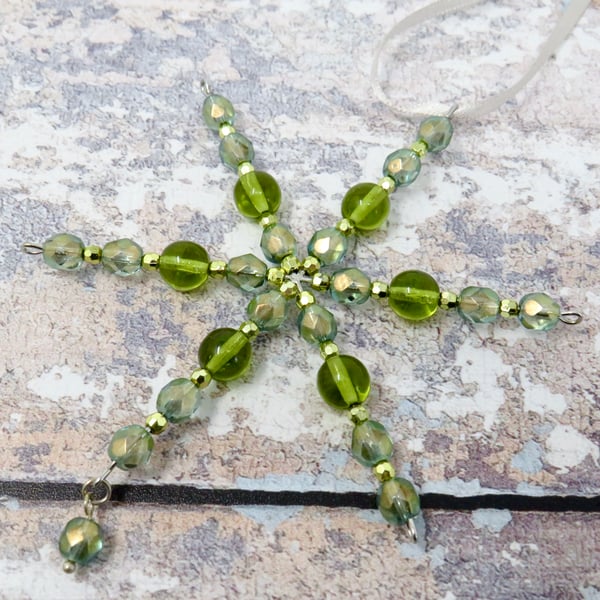 Green snowflake tree ornament