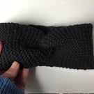 Hand knitted black wool ear warmers with a decorative twist