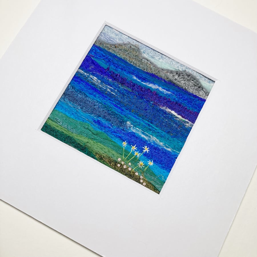 Silk textile art picture, mountains across the sea, with 8" x 8" mount