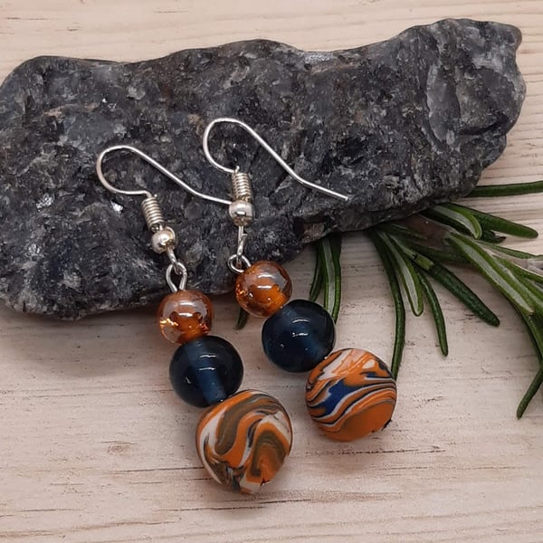 Dangly earrings in navy, orange and white  