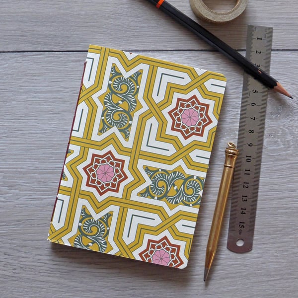 Handmade A6 notebook in with yellow and red patterned cover