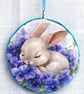 Bunnies decoupage log slice wall decoration