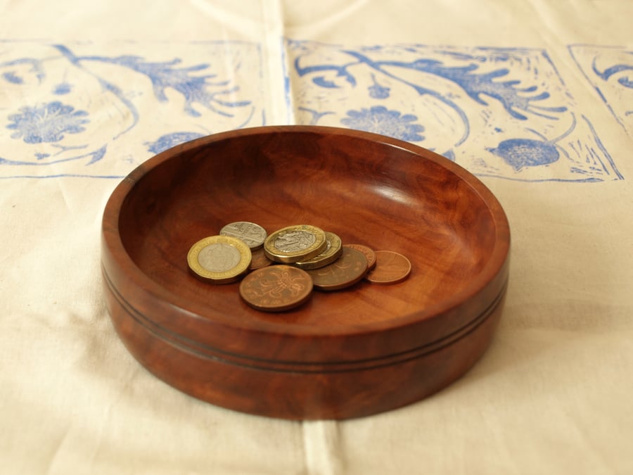 Simple and elegant, a hand turned Red Gum coin or key dish