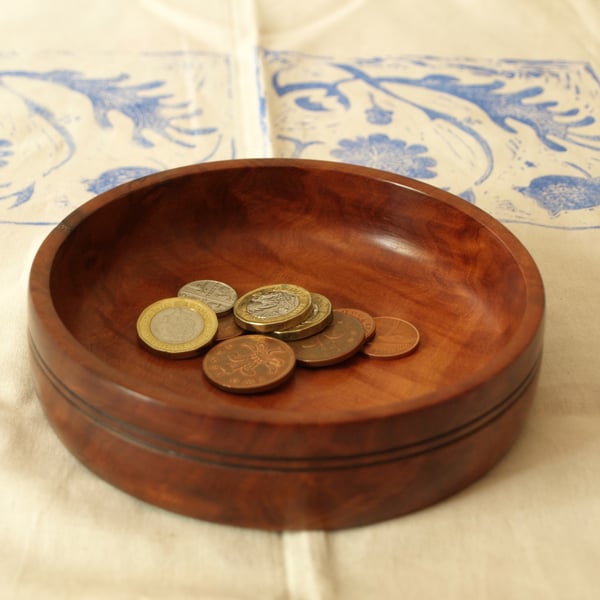 Simple and elegant, a hand turned Red Gum coin or key dish