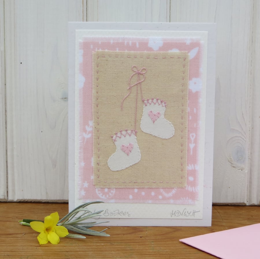 Pretty hand-stitched baby bootees with hearts and bow - very sweet!