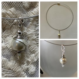 Pearl pendant on delicate wire choker